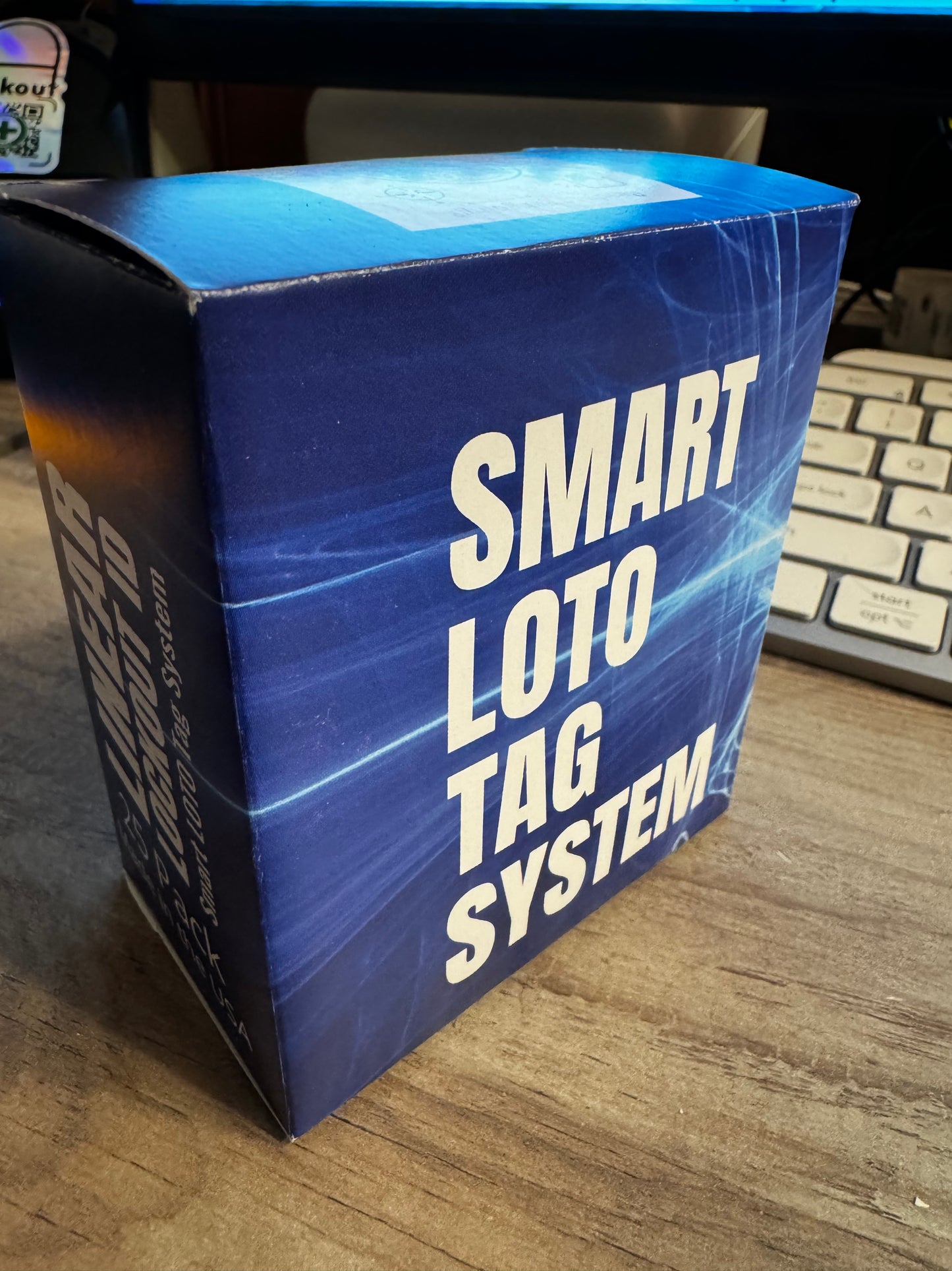 blue lockout id 25 pack box on a wooden table
